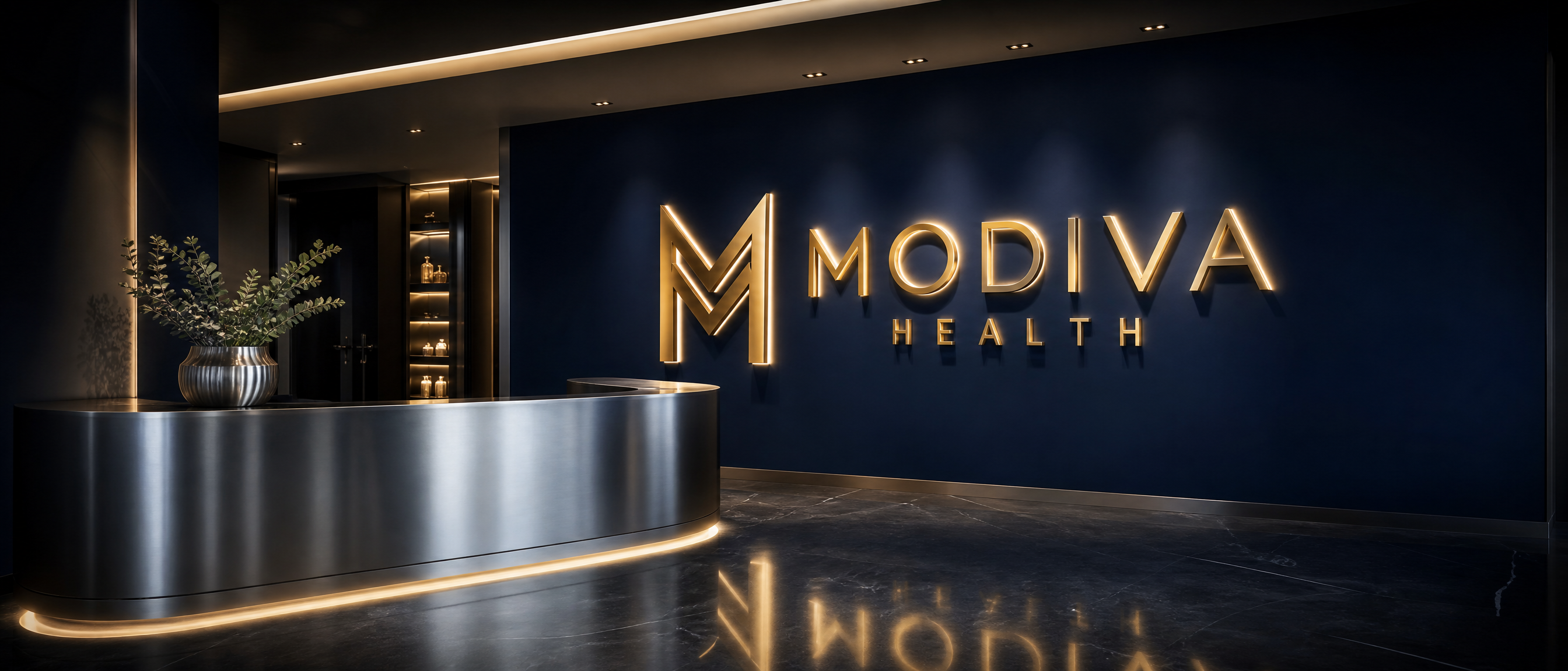 Modiva Health — illuminated gold brand mark in a luxury clinical wellness reception